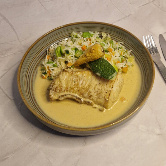 Zeewolf met saffraansaus en basmatirijst