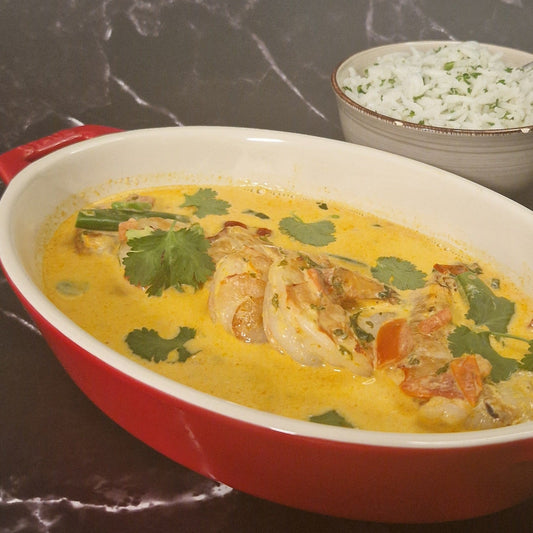 Scampi met romige Panang curry en basmatirijst van Arno’s to go in Beveren
